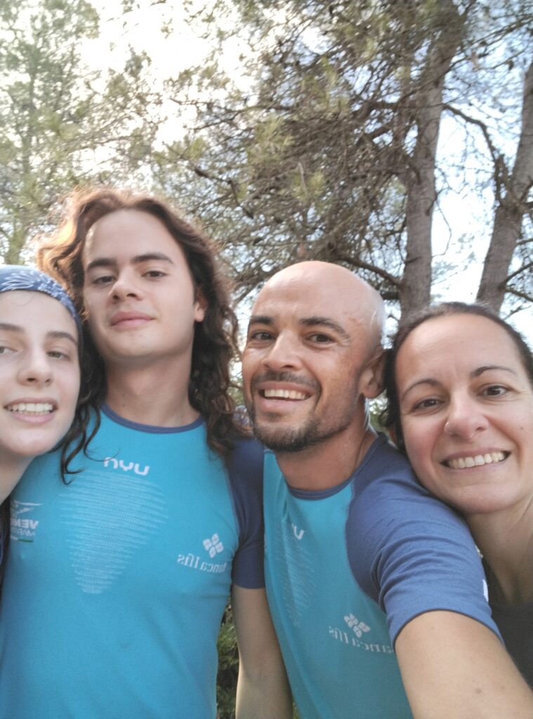 Pablo and Cristina and their kids running