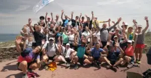 The group's victory photo, arms raised