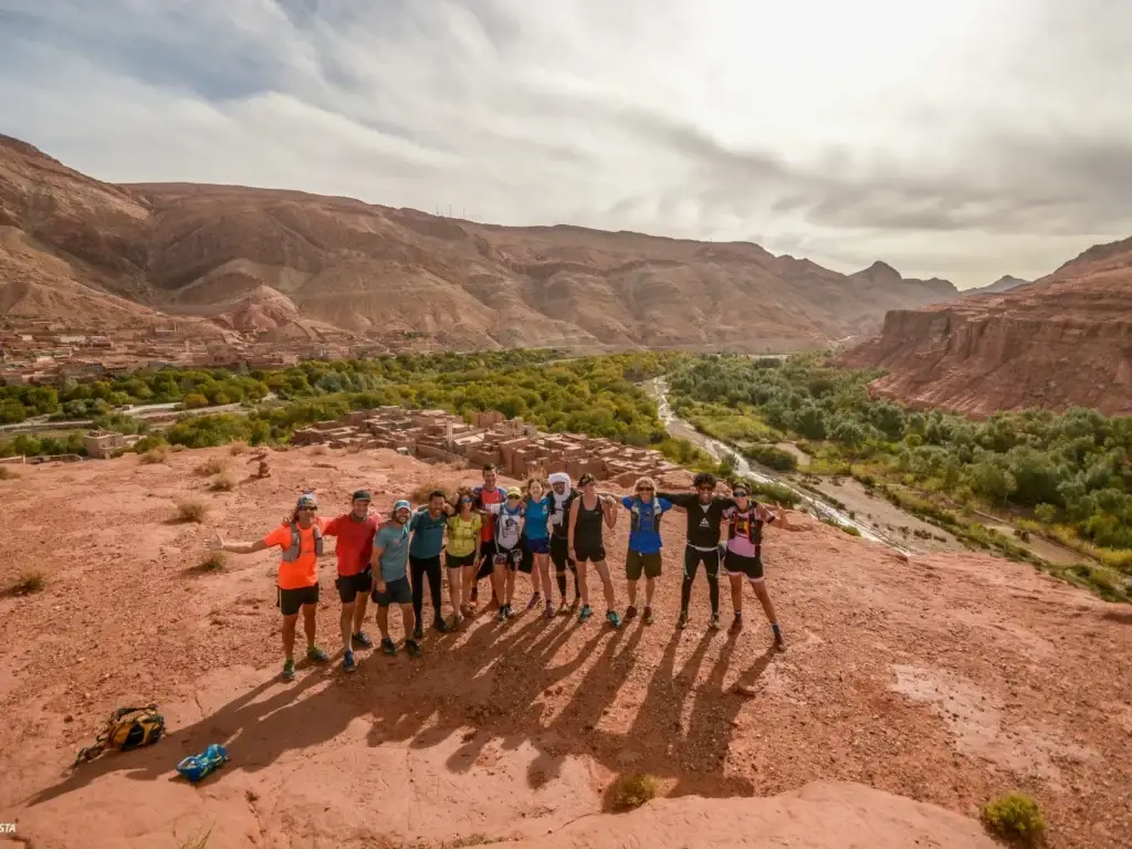 The group above a green oasis valley in the Atlas